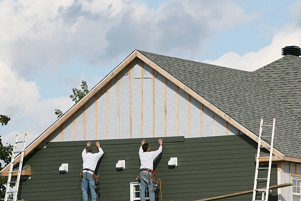 Professional Storm Damage Siding Repair technician working in Newark, TX